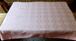 Pink damask tablecloth with a white pattern. 132 X 88 cm