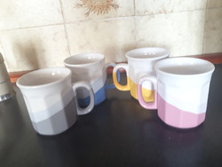 4 porcelain mugs in 4 colors with the same pattern