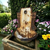 Retro, vintage, rustic cast iron wall fountain
