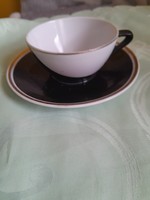 Black and white Raven House coffee cup