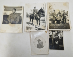 Five military-themed photos from a family's photo album are for sale together