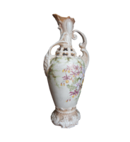 A richly decorated porcelain vase with a flower pattern