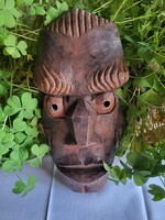Fa falikép_domborműves férfi fej