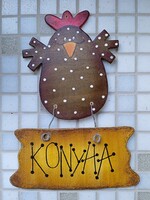 What a woman! Door sign with the inscription Rucis hen kitchen