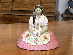Painted ceramic sculpture of a girl in a big skirt in folk costume, 1968