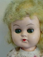 Small vintage English hard plastic baby doll, approx. 22 Cm