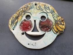 Cheerful little girl, rustic ceramic wall decoration
