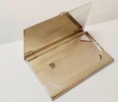 Retro fashion accessory. Silver-plated business card holder with painted logo