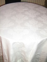 Beautiful damask tablecloth with white baroque flower pattern
