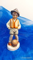 German sitzendorf faience figure, boy with a ball.