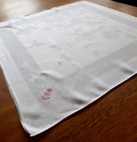 Damask tablecloth with a crown monogram in a wonderful pattern. 73X71 cm
