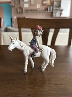 Pixies - a goblin sitting on a unicorn