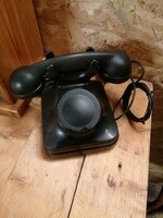 Black telephone with retro vinyl dial