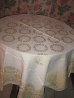 Beautiful damask tablecloth with a golden golden baroque pattern