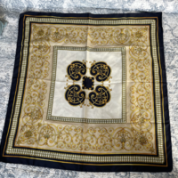 Elegant blue-gold scarf with a classic pattern