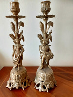Pair of female and male shaped candle holders. 27 cm