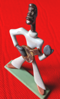 Metal figure of a Negro with a banjo