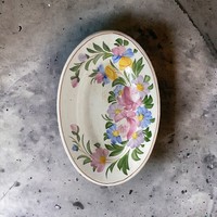 Retro, vintage ceramic decorative plate with flower pattern