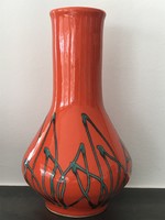 Retro ceramic vase on an orange base with a green pattern, 26 cm