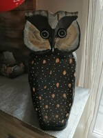 Wooden newspaper stand in the shape of an owl