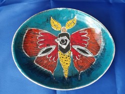 Paul Francis in ceramic bowl