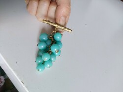 Beautiful brooch in turquoise and gold, larger size 8x4.5 cm