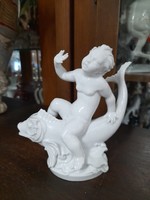 German, Germany Rosenthal putto sitting on a fish, child figural sculpture, porcelain figure. G. Opel. 14.5 Cm.