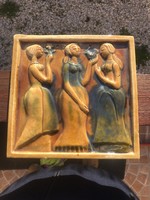 The three graces is an applied art ceramic wall decoration