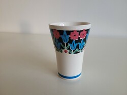 Old granite cup with a tulip pattern