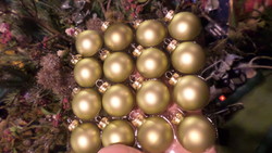 16 never used, new, 4 cm, glass Christmas tree ornaments in one. Light, maybe pistachio green.
