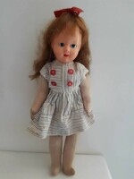 A small doll with a vintage textile body in its original clothes, approx. 36 Cm, 60s-70s
