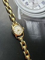 Gold doxa with gold strap