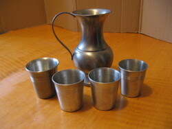 Tin, cinn jug with 4 dn stamp