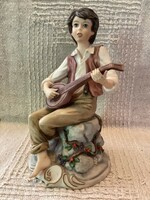 Capodimonte marked vivian c. Statue figure of a boy playing a mandolin