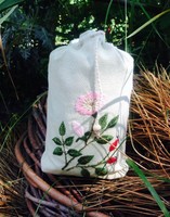 Embroidered herbal bag with rosehip pattern