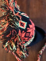 Rooster-crested, boy's, Norwegian pattern, knitted cap. With a colorful pattern.