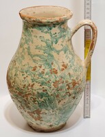 Folk ceramic milk jug with light green glaze spots and white glaze (2965)