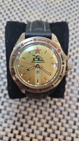 Soviet komandirskie mechanical watch with a tank. Rare gold-colored dial.