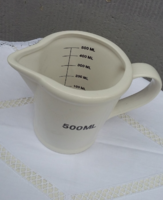 Thick, porcelain pouring, measuring vessel