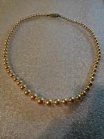 String of pearls with a beautiful marked clasp