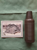 A thermos and a map
