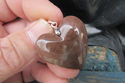 A heart-shaped pendant made of 