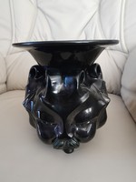 Gorka geza: vase with three mustachioed devil faces