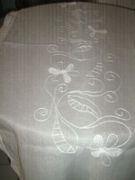 Filigree tablecloth runner embroidered in beautiful white material
