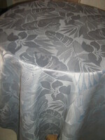 Elegant woven tablecloth with a beautiful blue leaf pattern