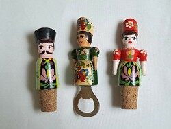 A pair of hand-painted retro Hungarian tobacconist's wooden bottle openers and corkscrews with a Kalocsa pattern