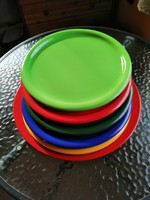 Colorful plates with serving bowl