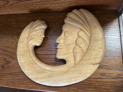 Carved mother and child wall decoration