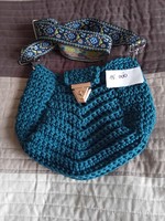 Crossbody bag crocheted from cord yarn