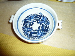 Hollow ceramic bowl with a blue flower pattern